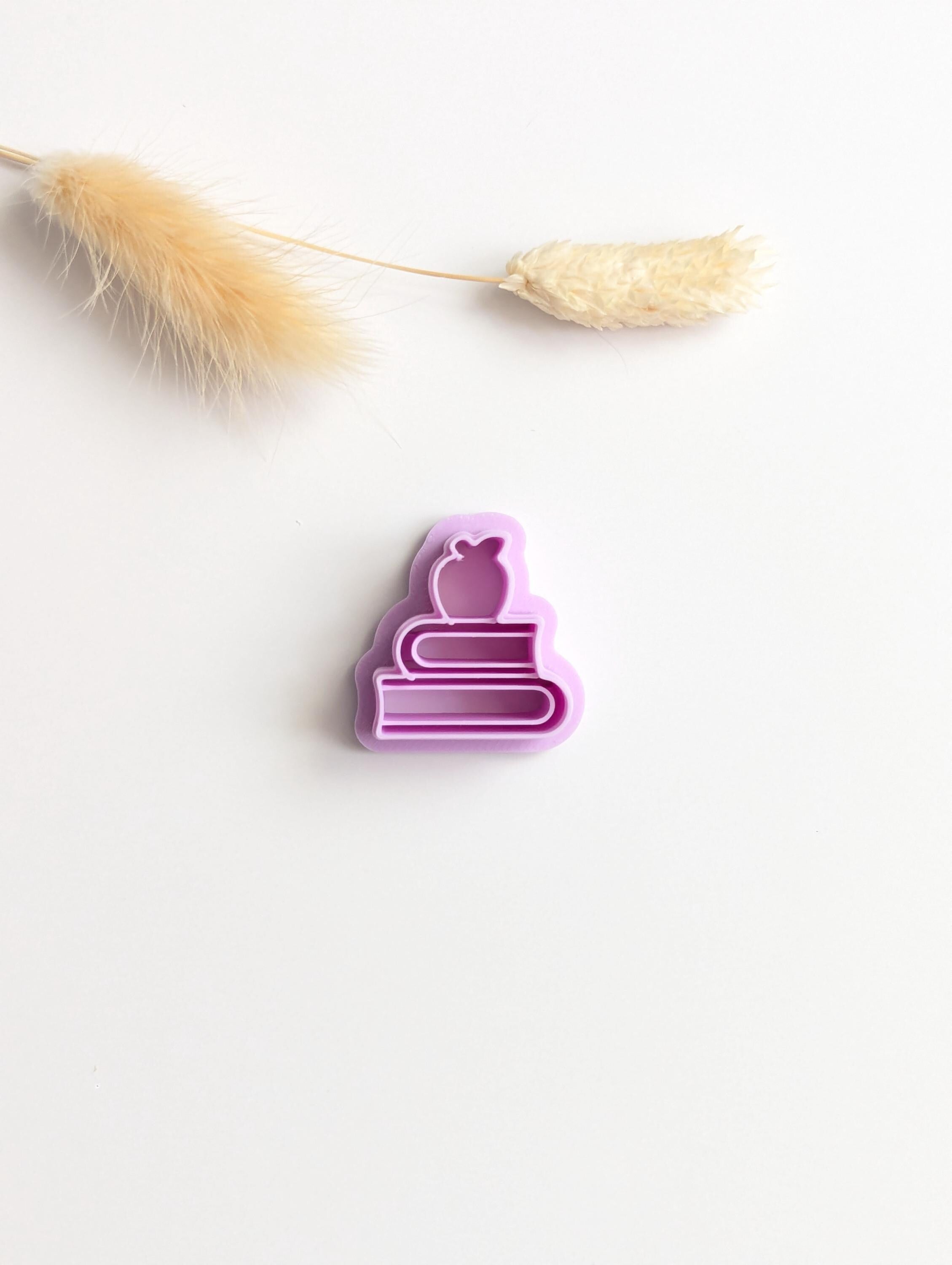 Apple and books polymer clay cutter
