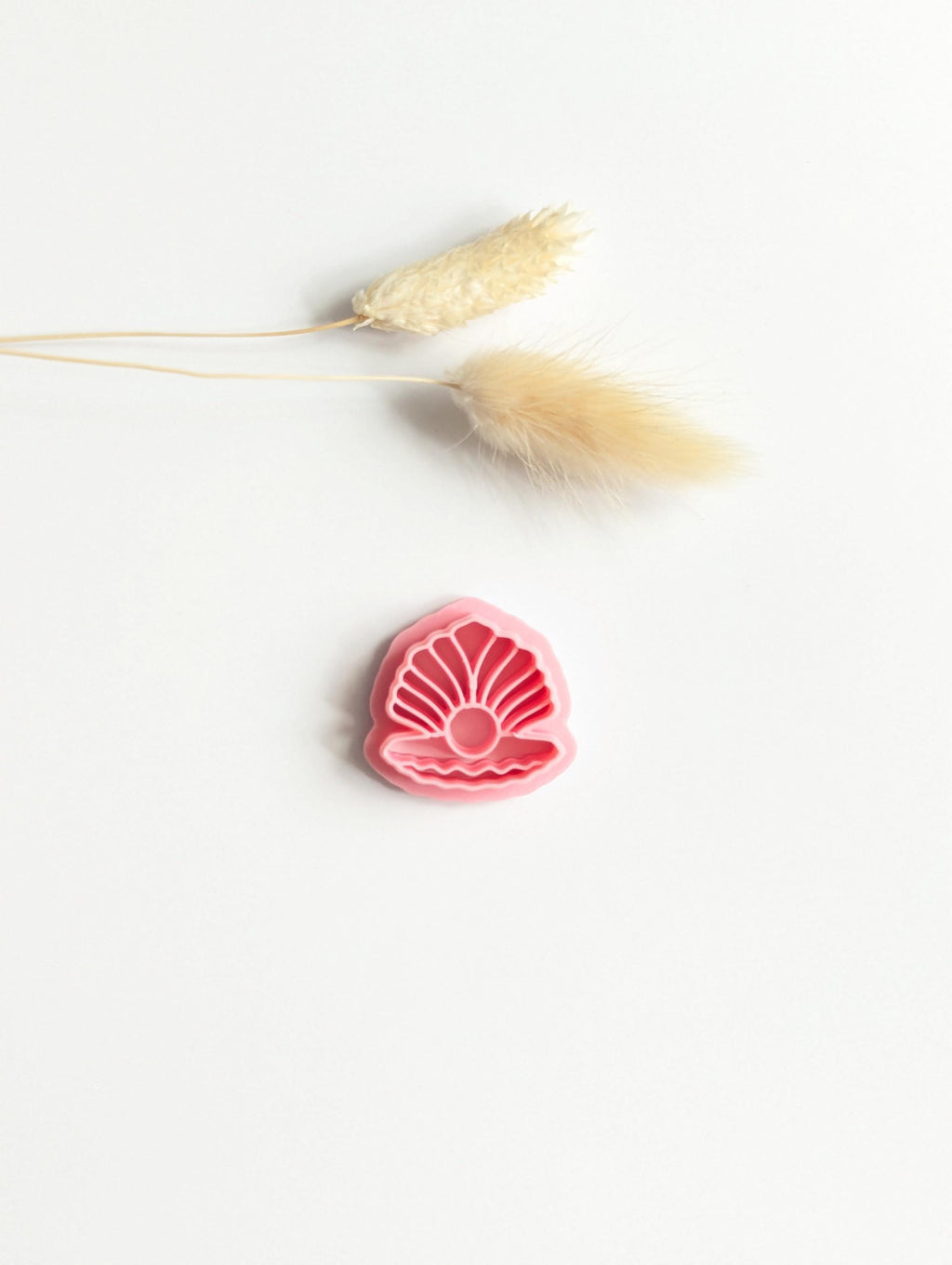 Clam shell with pearl polymer clay cutter