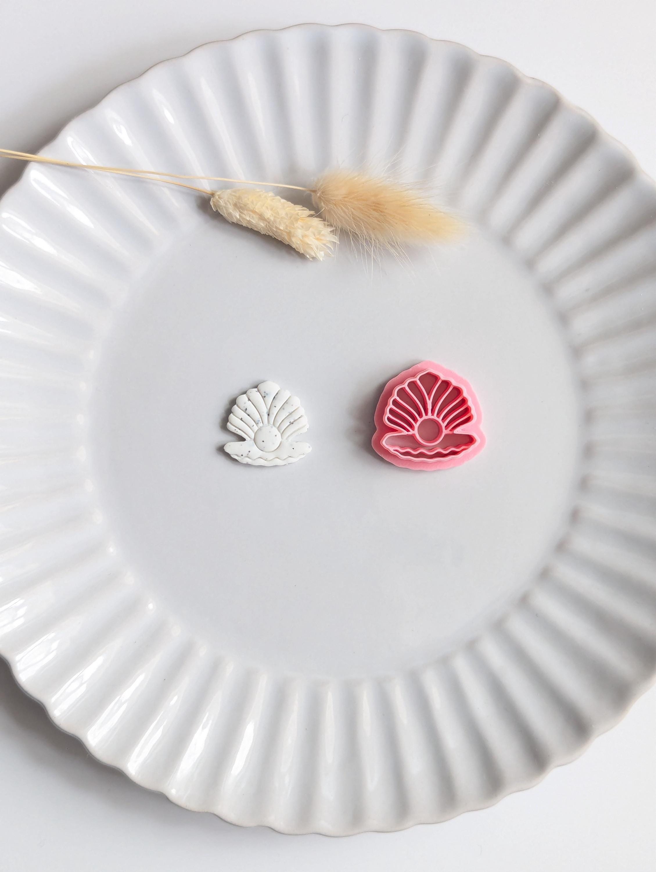 Clam shell with pearl polymer clay cutter