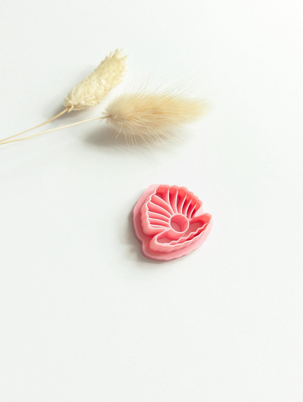 Clam shell with pearl polymer clay cutter