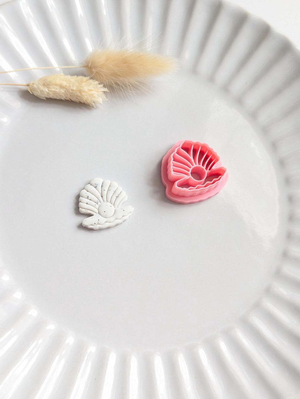 Clam shell with pearl polymer clay cutter
